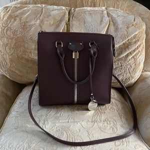 Frank Lyman burgundy handbag